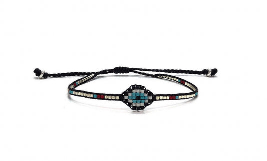 Delicate eyebead bracelet in silver